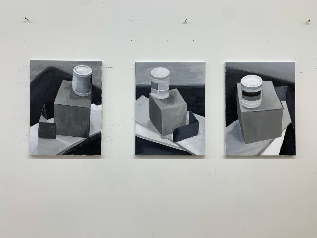Three finished acrylic still life paintings from one class session, three painters, three results.