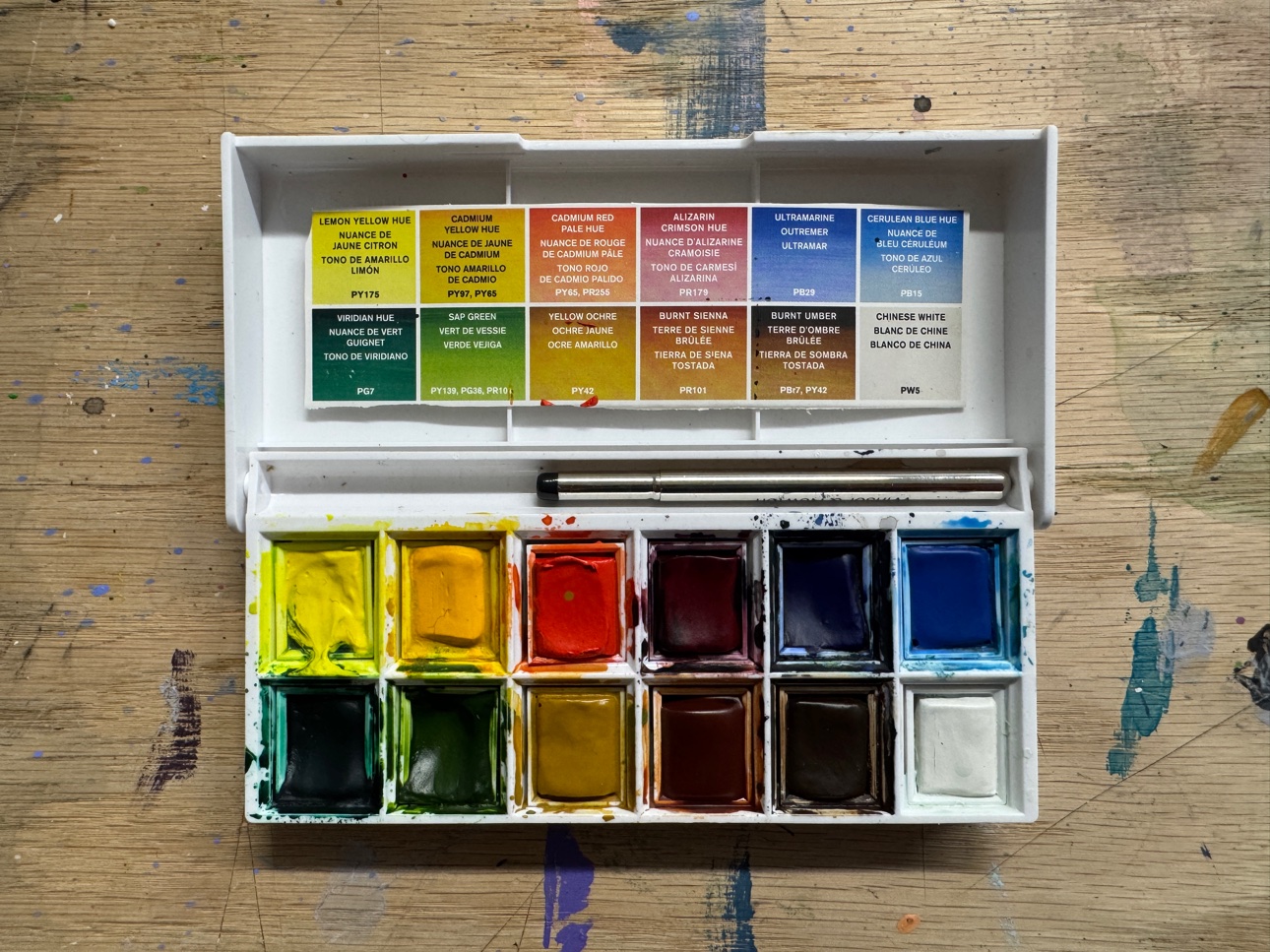 A watercolor set provided for students in class. Every material is waiting at your spot when you arrive.
